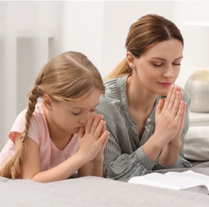 mother daughterpraying