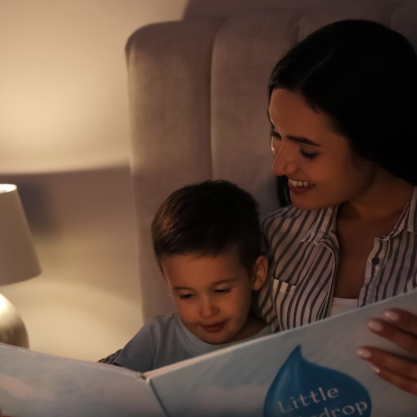Benefit of Short Bedtime Stories mom reading to son in bed